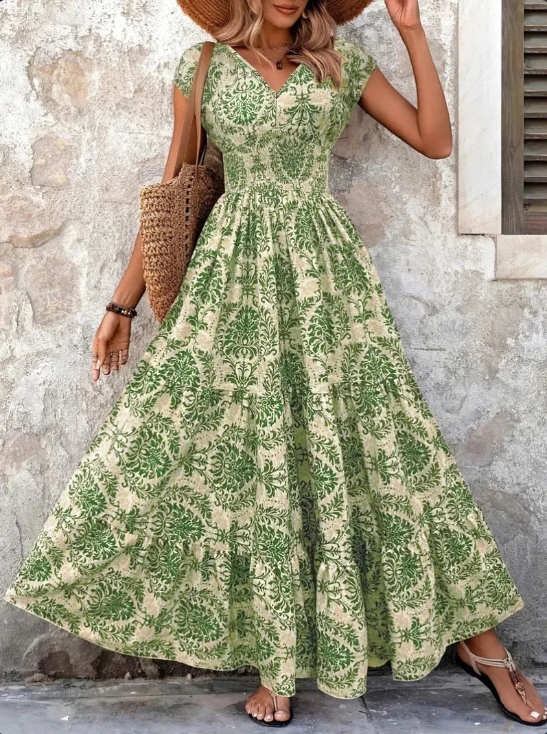 https://cdn.shopify.com/s/files/1/0703/0053/2815/files/Damen_Festliches_Kleid_mit_Blumenmuster_und_V-Ausschnitt_Jully_9.webp